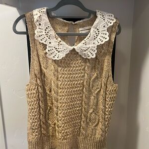 Anthropologie sweater with lace collar.